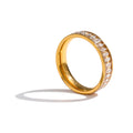 Cubic zirconia geometric ring in 18K gold-plated stainless steel with cubic zirconia.
