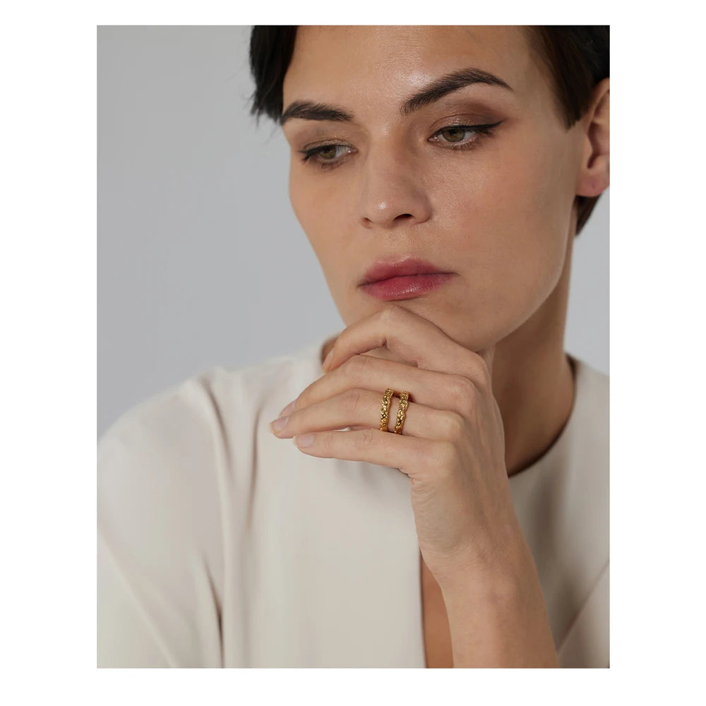 Geometric ring in 18K gold-plated stainless steel.