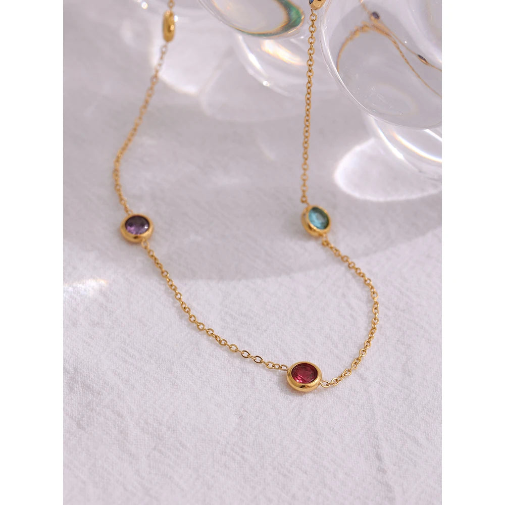 Cubic zirconia multi-color geometric necklace in gold-plated 316L stainless steel with cubic zirconia.