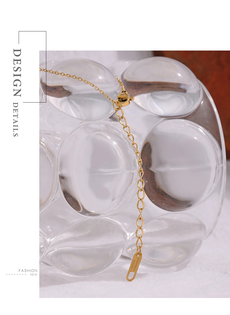Cubic zirconia multi-color geometric necklace in gold-plated 316L stainless steel with cubic zirconia.