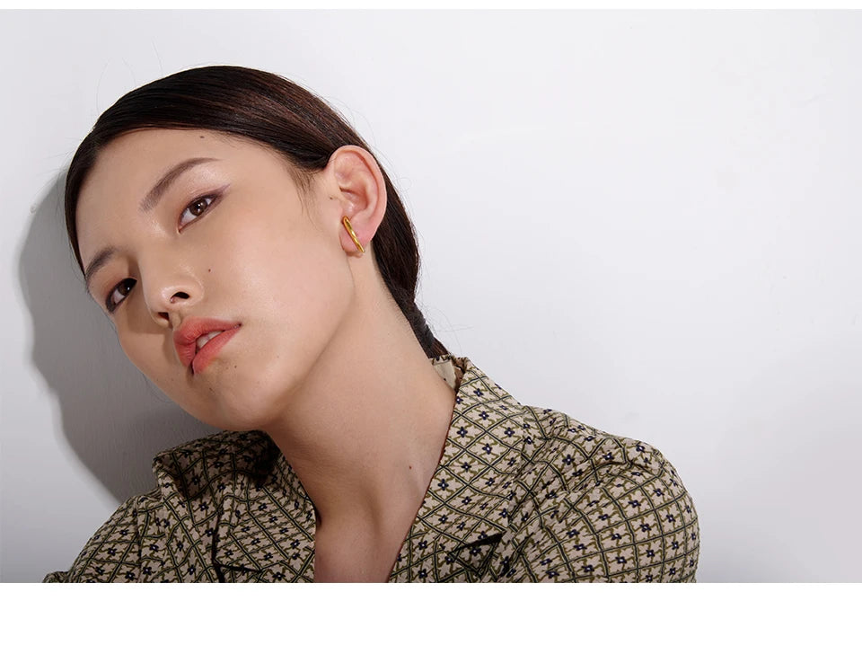 Geometric earrings in gold-plated stainless steel.