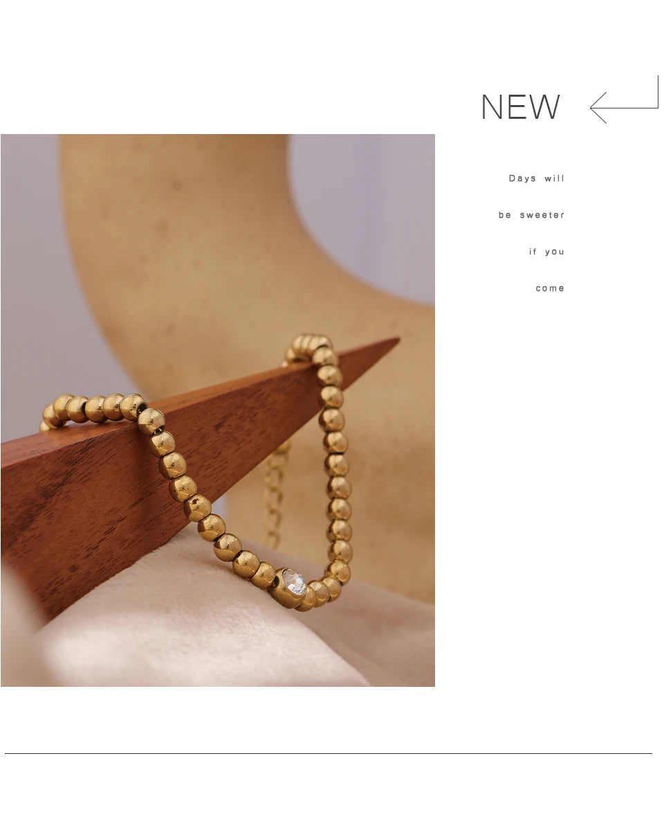 Cubic Zirconia Beaded Geometric Bracelet — Gold-Plated Stainless Steel with Cubic Zirconia · PS1573