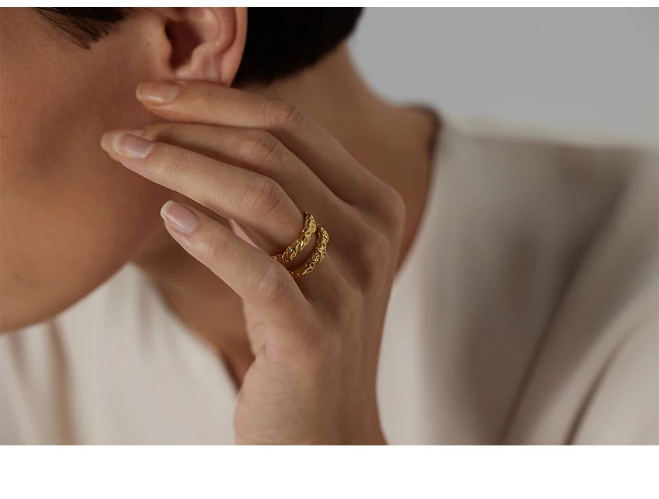Geometric ring in 18K gold-plated stainless steel.