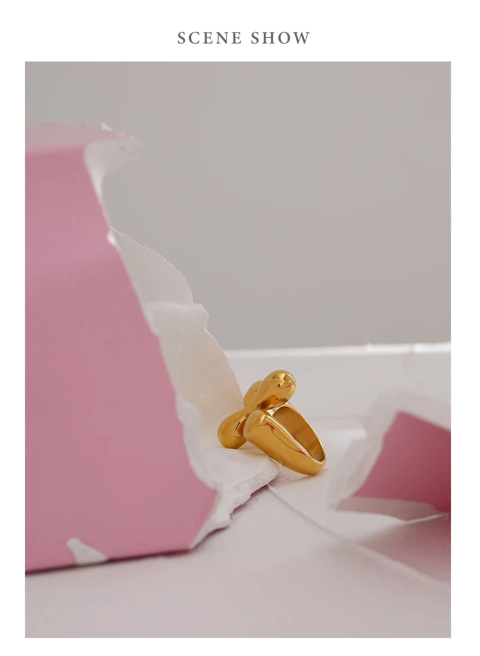 Hammered geometric ring in 18K gold-plated stainless steel.