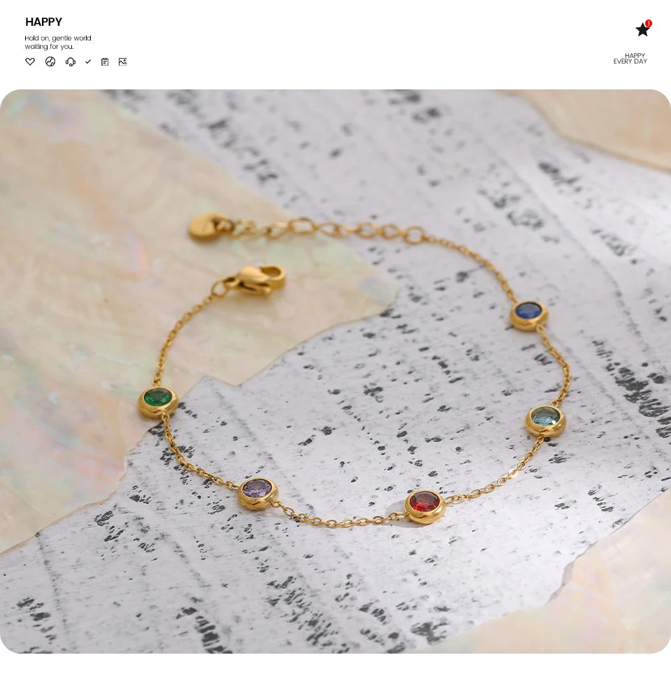 Cubic zirconia multi-color geometric necklace in gold-plated stainless steel with cubic zirconia.