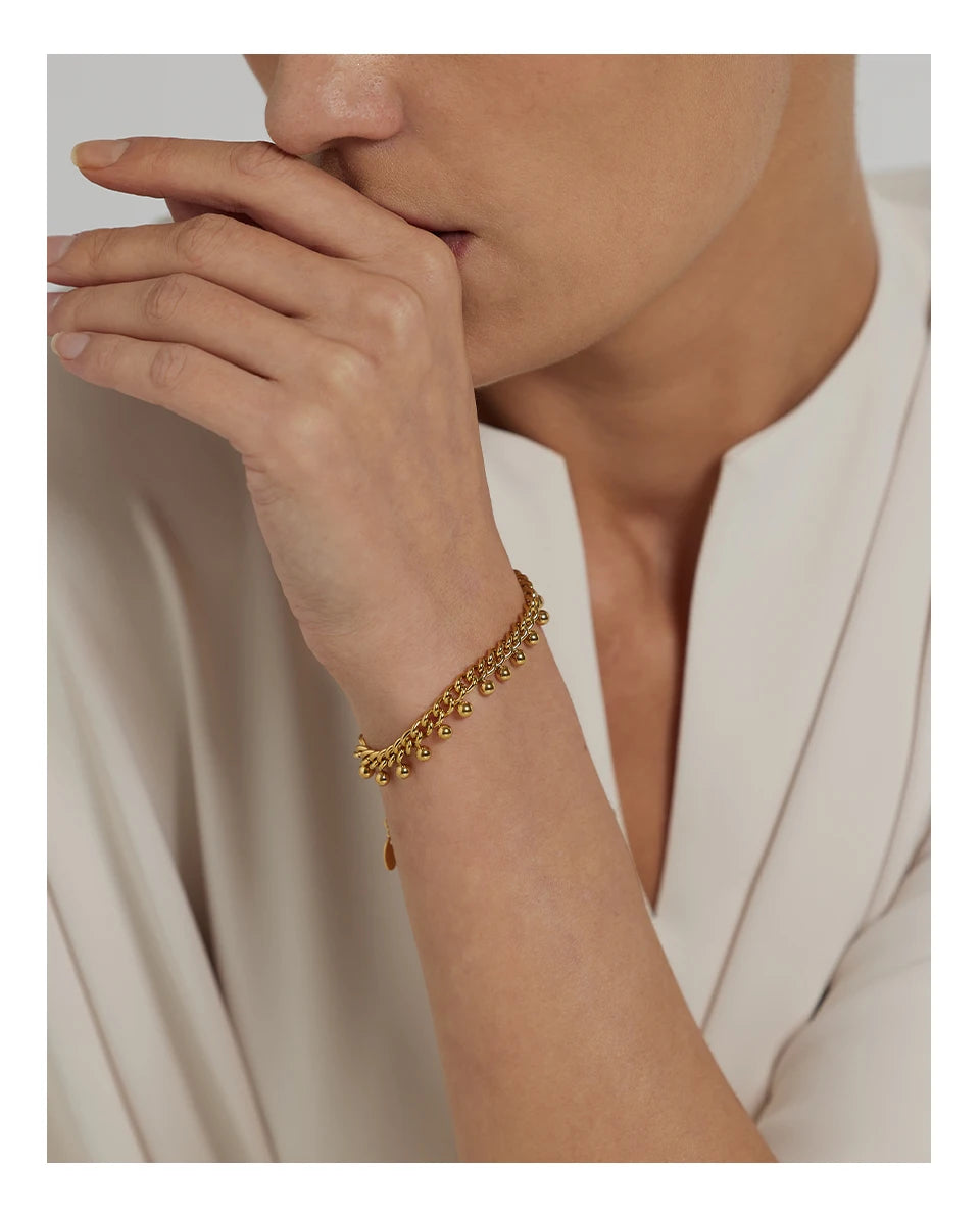 Beaded geometric chain bracelet in 18K gold-plated 316L stainless steel.