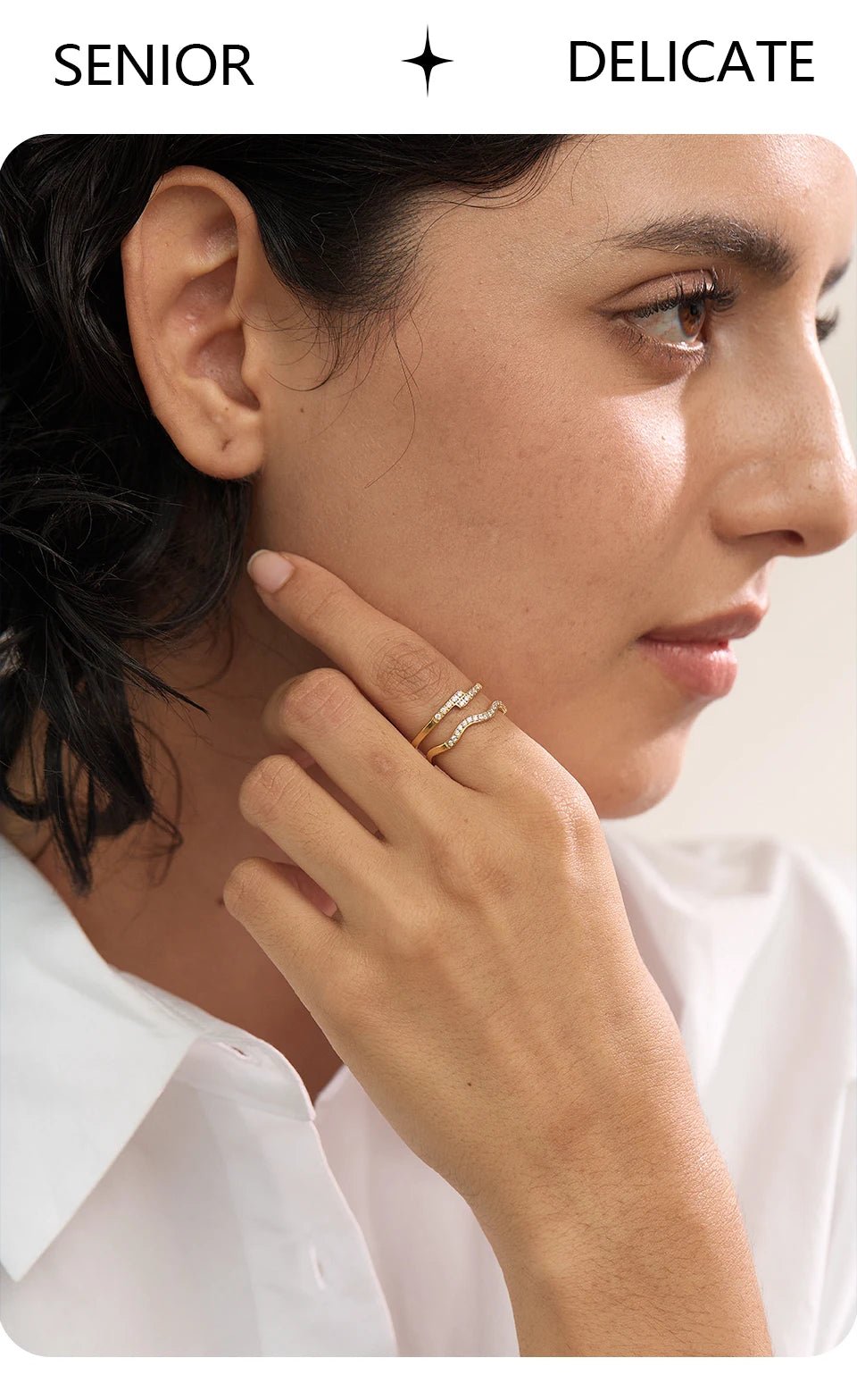 Cubic zirconia geometric ring in 18K gold-plated stainless steel with cubic zirconia.