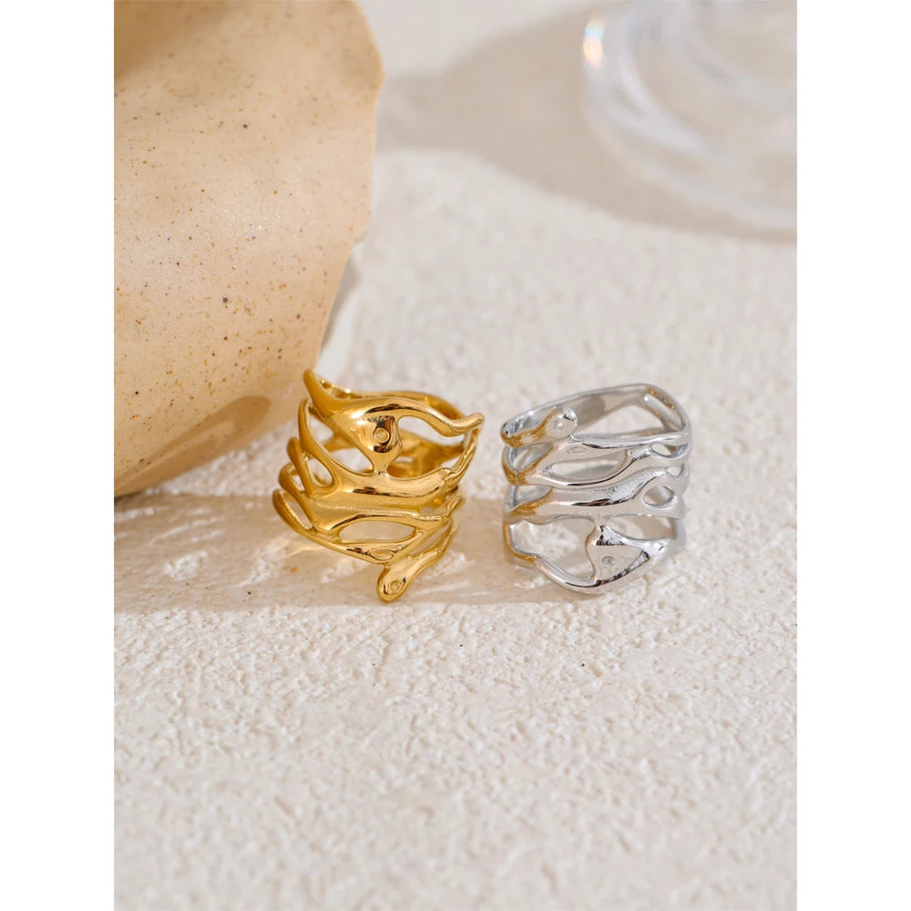 Geometric layered ring in gold-plated 316L stainless steel.