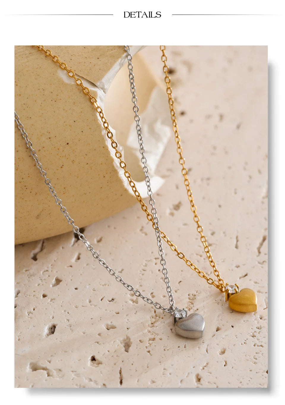 Cubic zirconia heart necklace in gold-plated stainless steel with cubic zirconia.