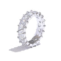 Cubic zirconia heart geometric ring in gold-plated stainless steel with cubic zirconia.