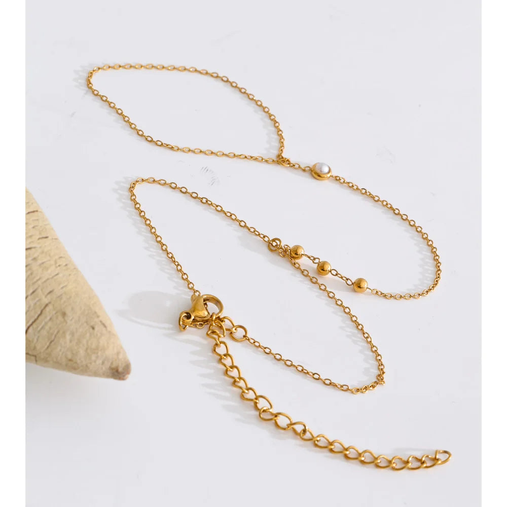 Cubic Zirconia Pearl Geometric Bracelet — Gold-Plated Stainless Steel with Pearl and Cubic Zirconia · PS1349