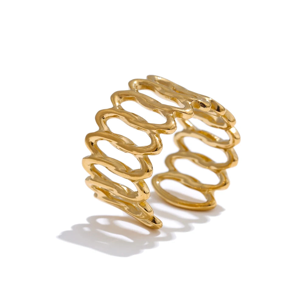 Geometric ring in gold-plated stainless steel.