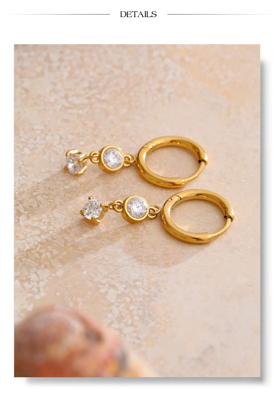 Cubic zirconia geometric earrings in gold-plated stainless steel with cubic zirconia.