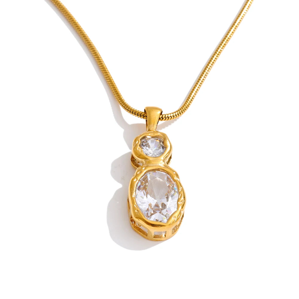 Cubic zirconia geometric necklace in gold-plated stainless steel with cubic zirconia.