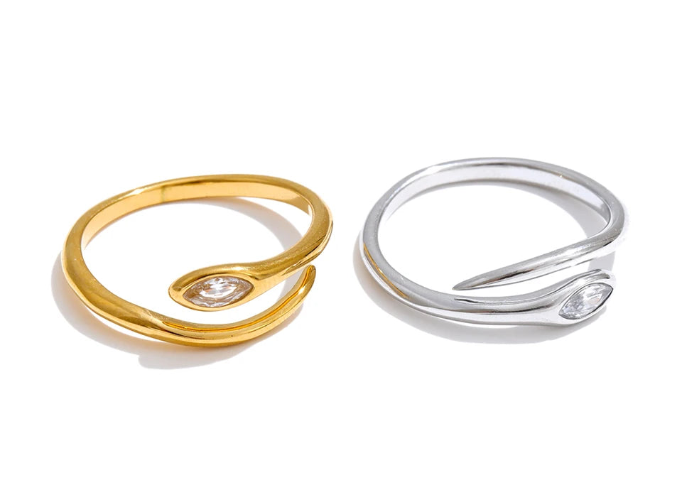 Cubic zirconia snake geometric ring in 18K gold-plated stainless steel with cubic zirconia.