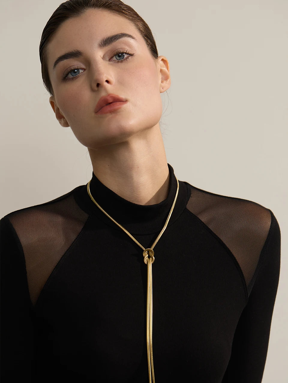 Snake geometric chain necklace in gold-plated stainless steel.