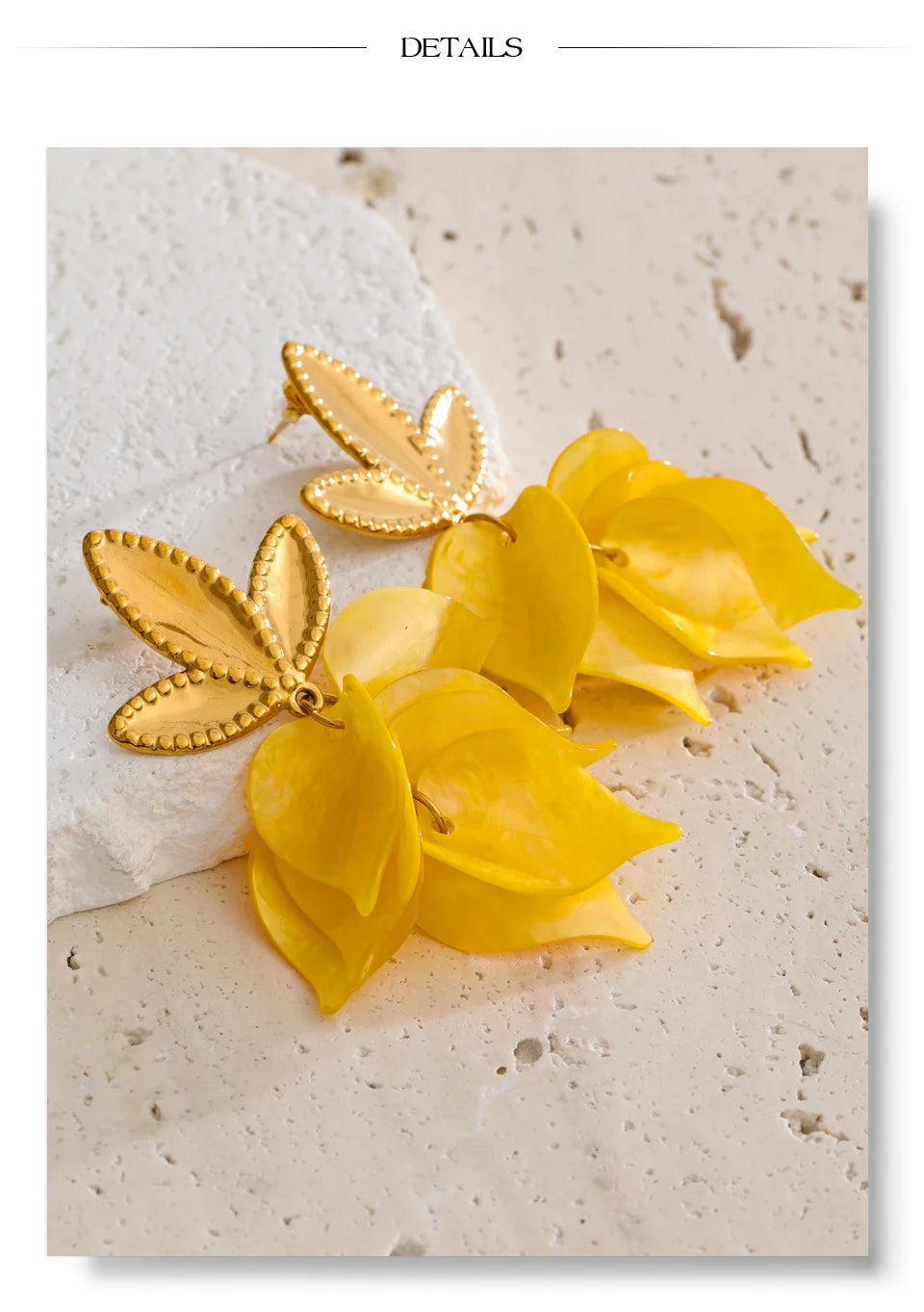 White resin acrylic earrings in gold-plated stainless steel with resin and acrylic.