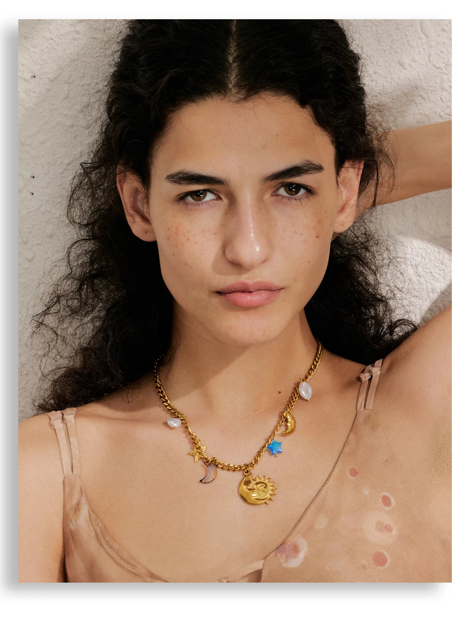 Sun geometric necklace in gold-plated stainless steel.