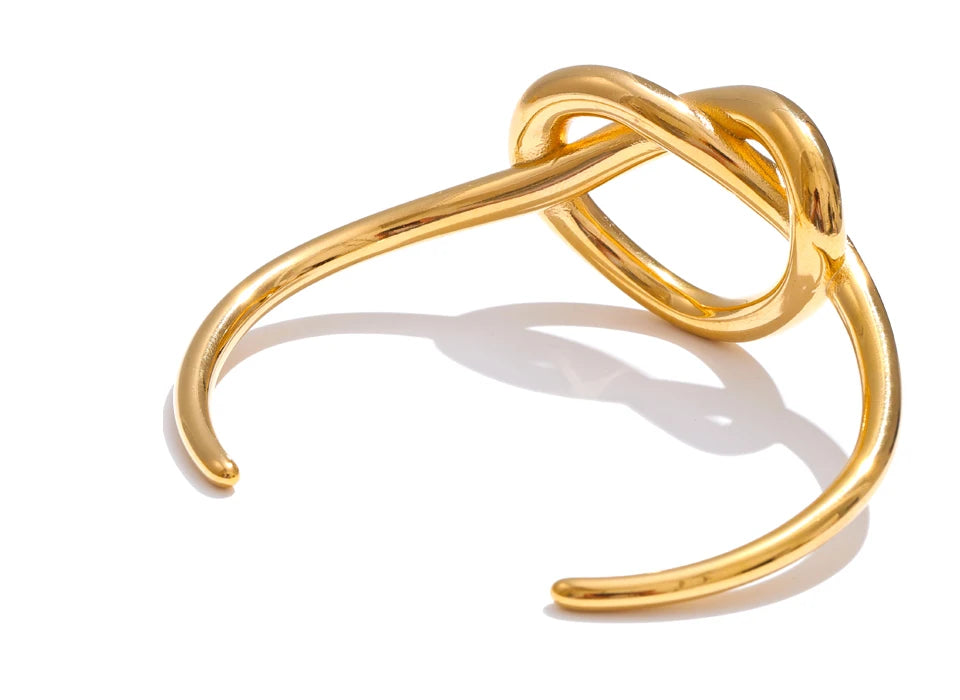 Heart bracelet in gold-plated stainless steel.