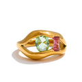 Cubic zirconia geometric ring in 18K gold-plated stainless steel with cubic zirconia.