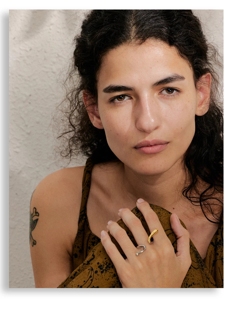 Geometric ring in 18K gold-plated stainless steel.