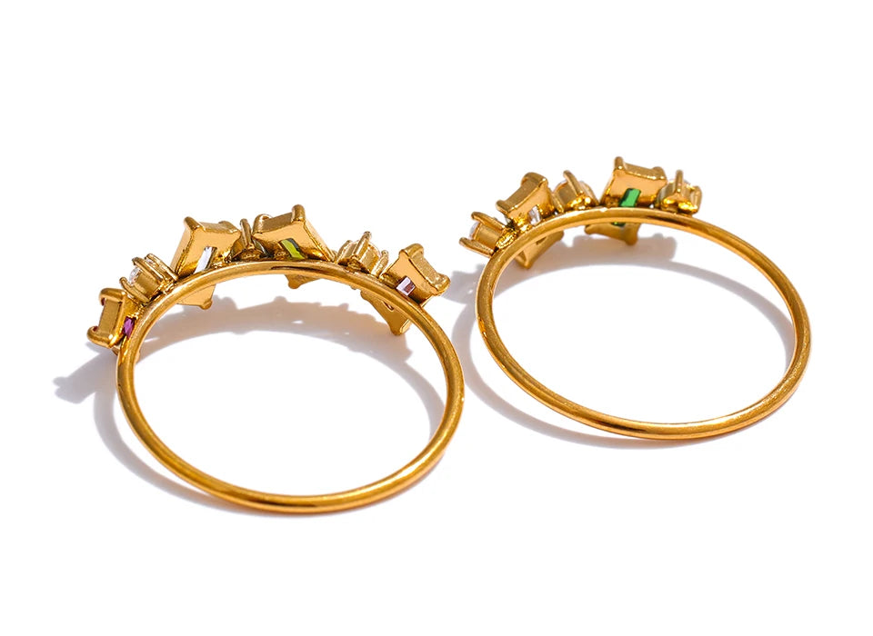 Cubic zirconia multi-color geometric ring in 18K gold-plated stainless steel with cubic zirconia.