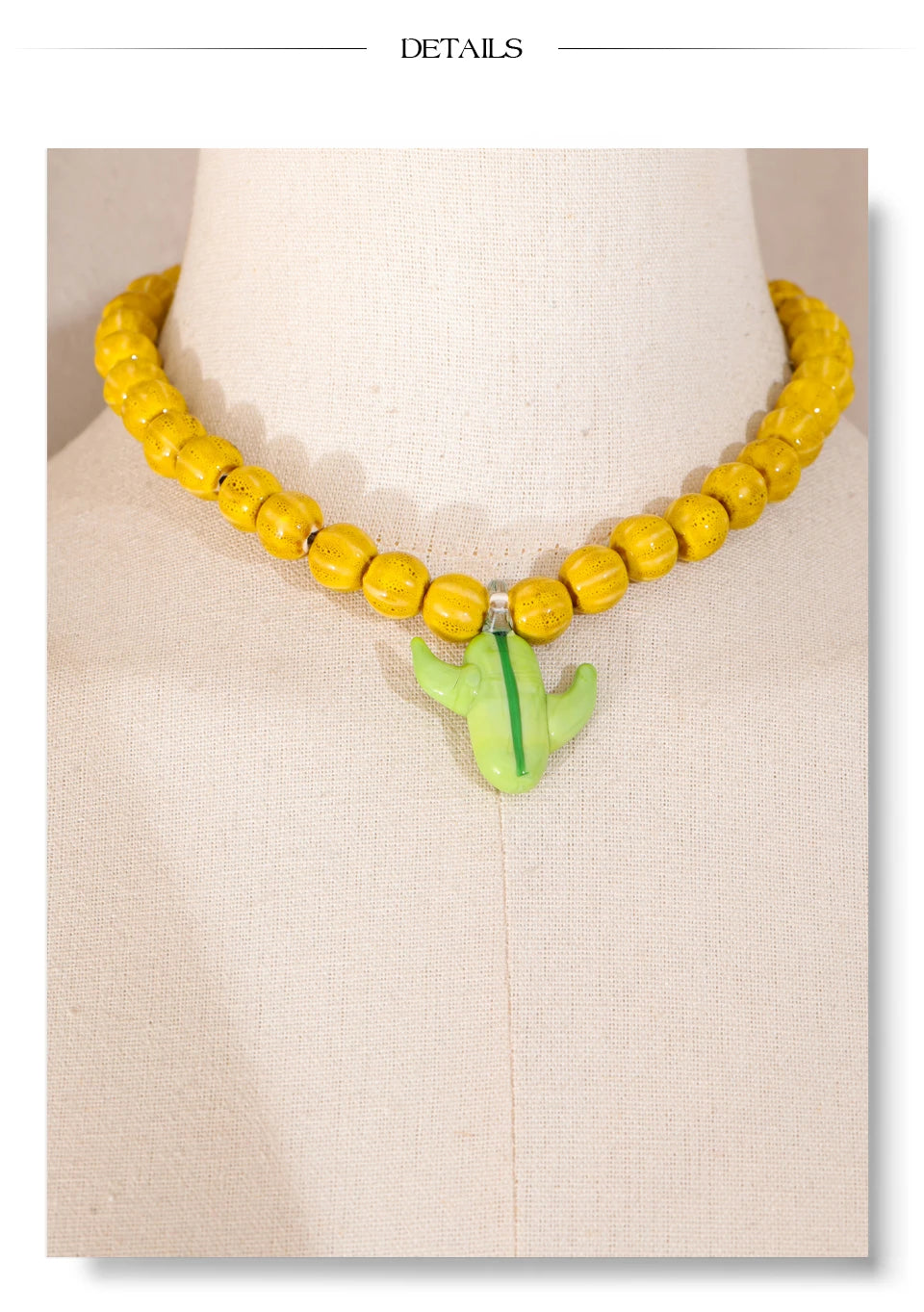 Blue beaded geometric necklace in gold-plated stainless steel.