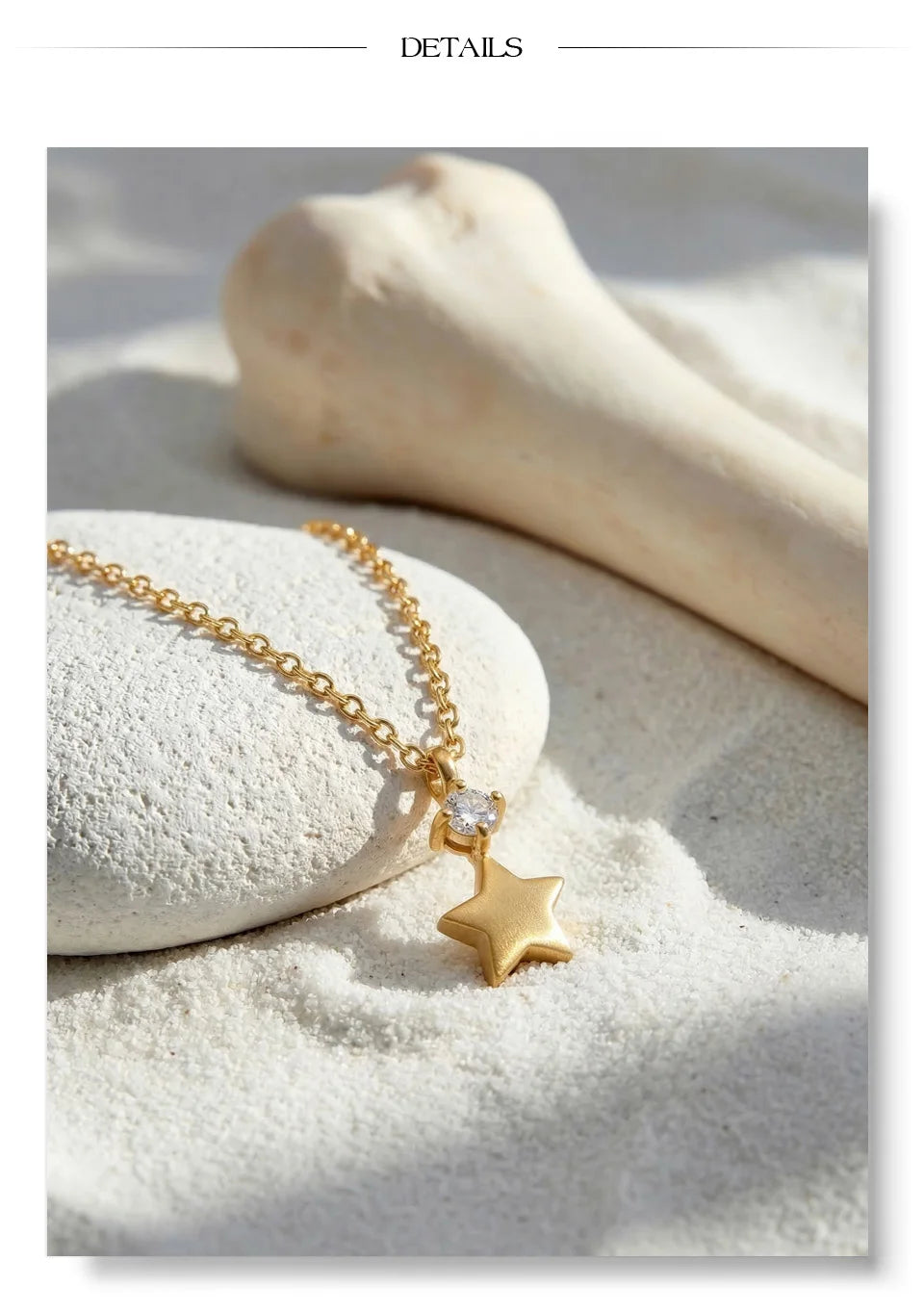 Cubic zirconia star necklace in gold-plated stainless steel with cubic zirconia.