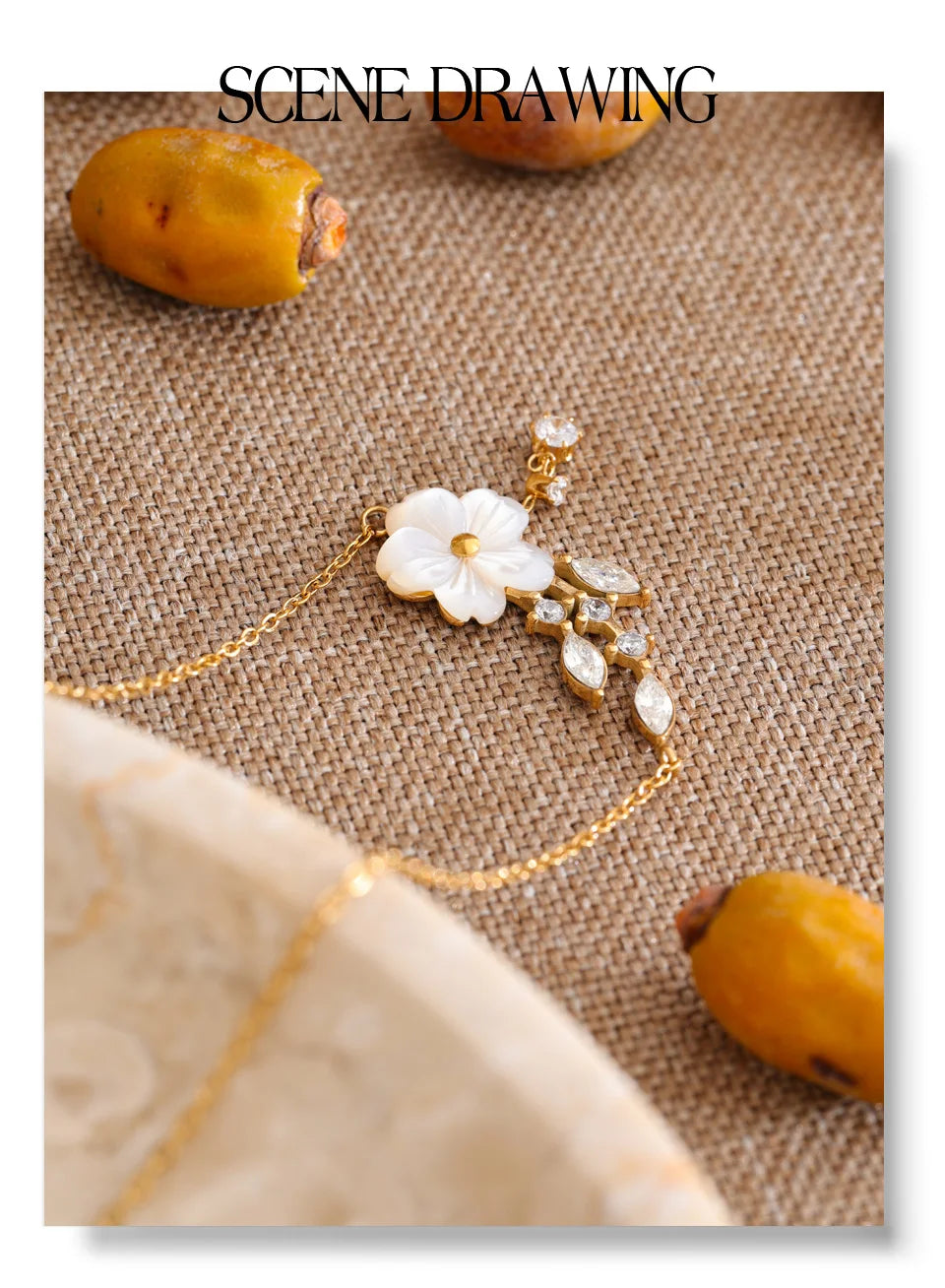 Cubic zirconia shell flower necklace in gold-plated stainless steel with cubic zirconia and shell.