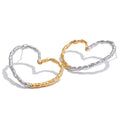 Heart minimalist earrings in gold-plated stainless steel.
