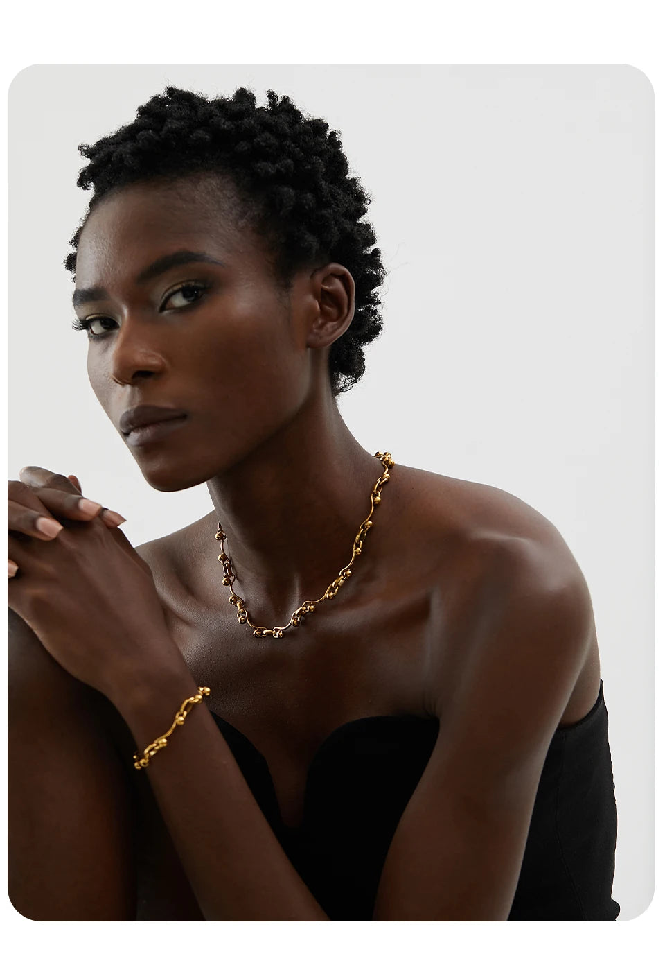 Geometric chain necklace in 18K gold-plated stainless steel.