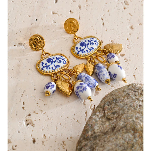 Blue heart flower earrings in gold-plated stainless steel.