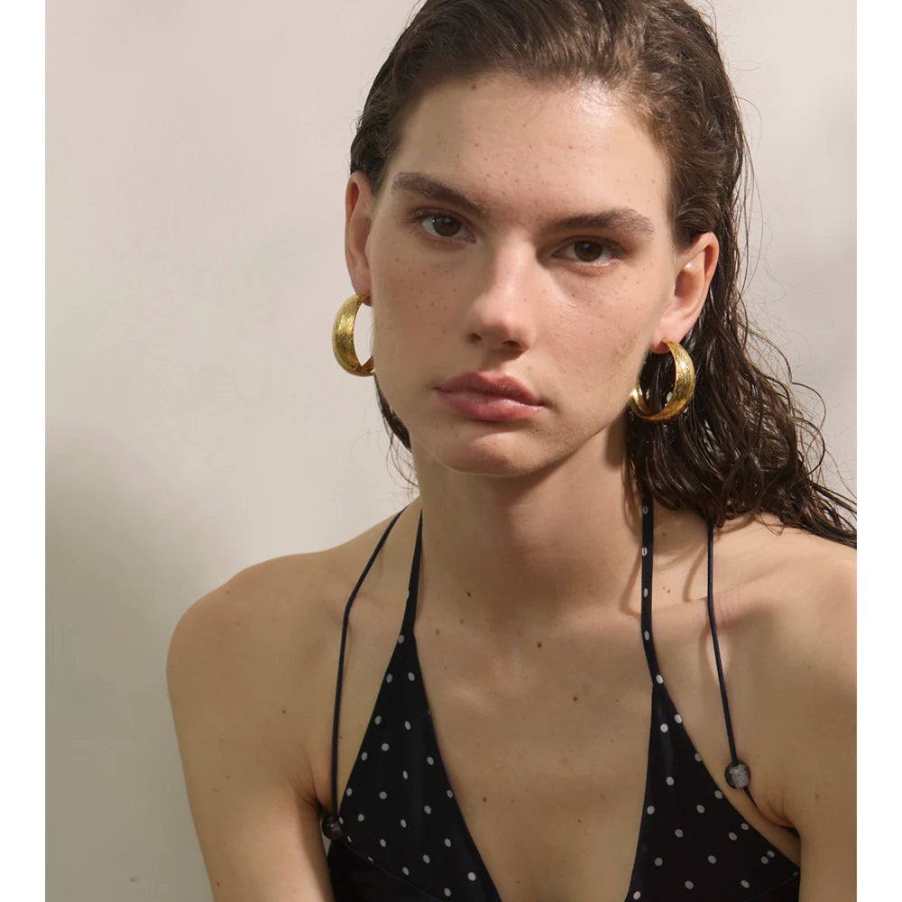 Geometric earrings in gold-plated stainless steel.