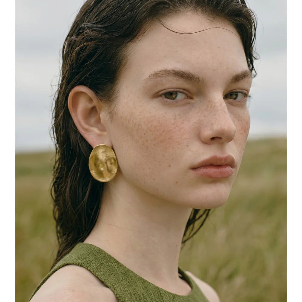 Geometric earrings in 14K gold-plated stainless steel.