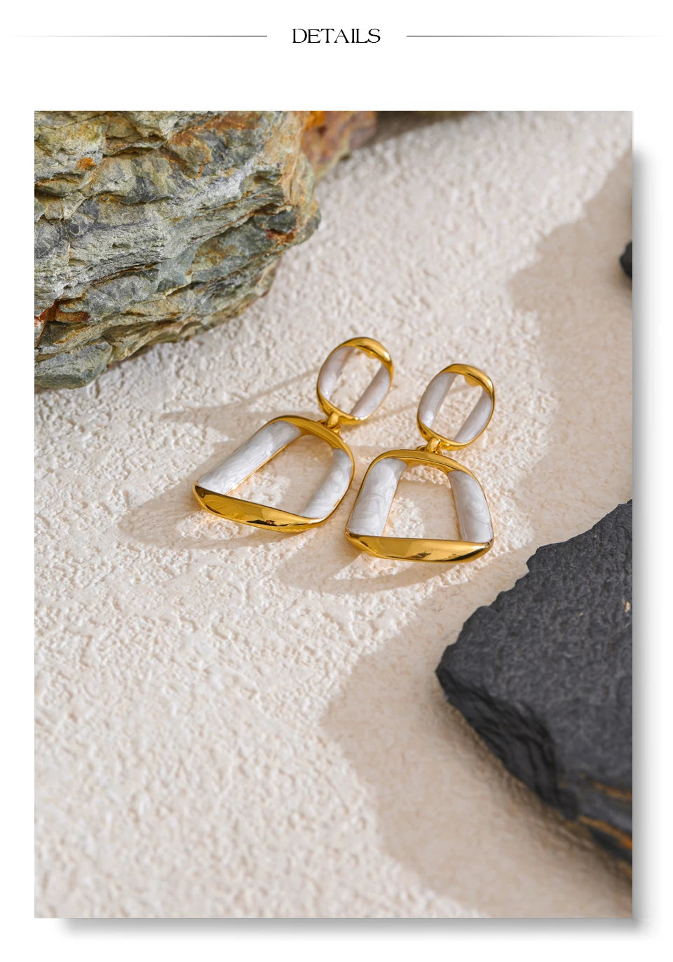 White enamel geometric earrings in gold-plated stainless steel with enamel.