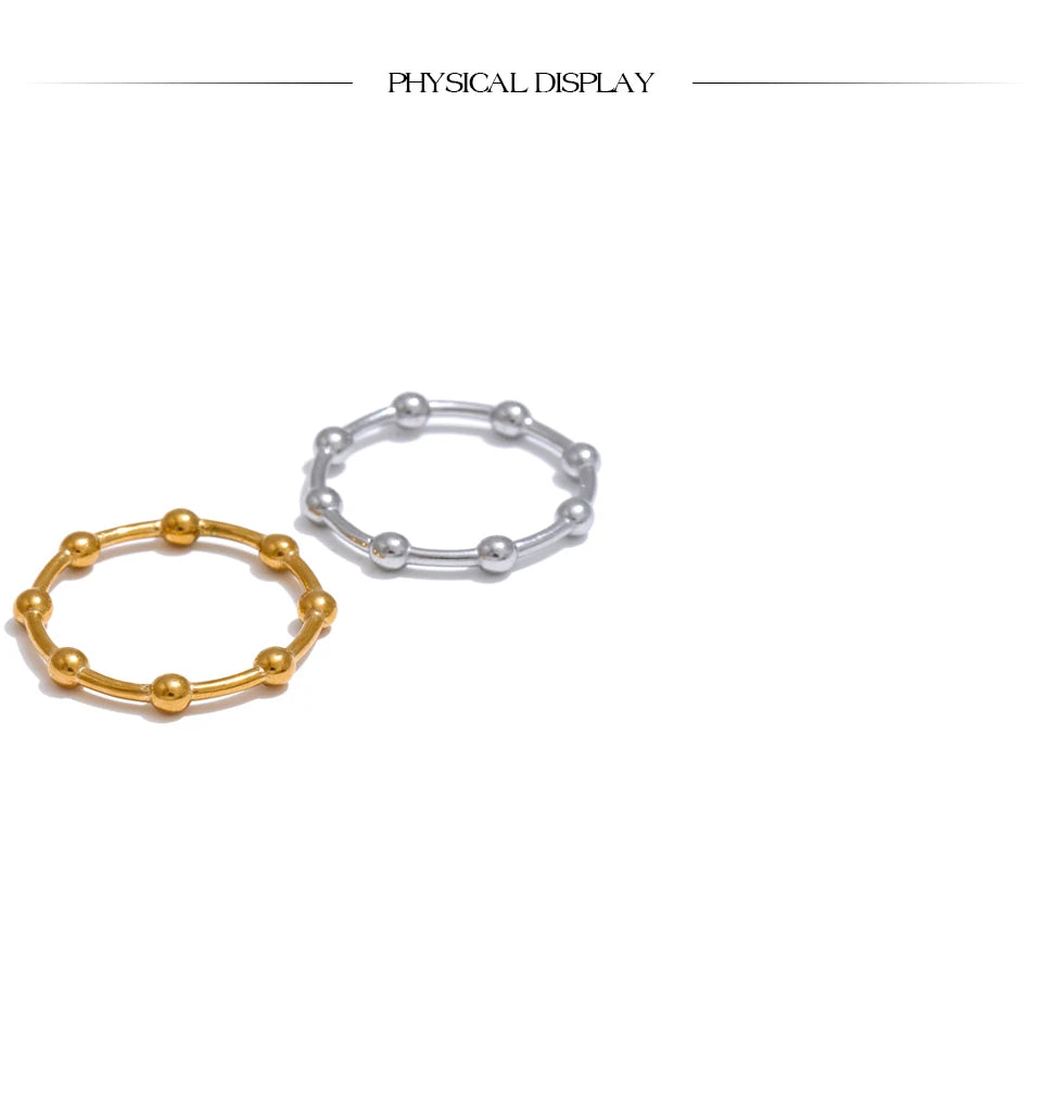Beaded minimalist geometric ring in 18K gold-plated stainless steel.