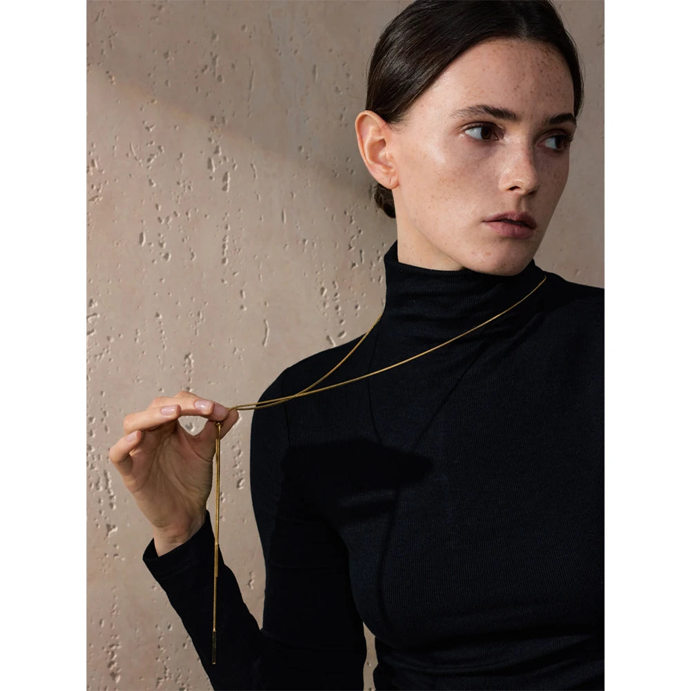 Geometric chain necklace in gold-plated stainless steel.