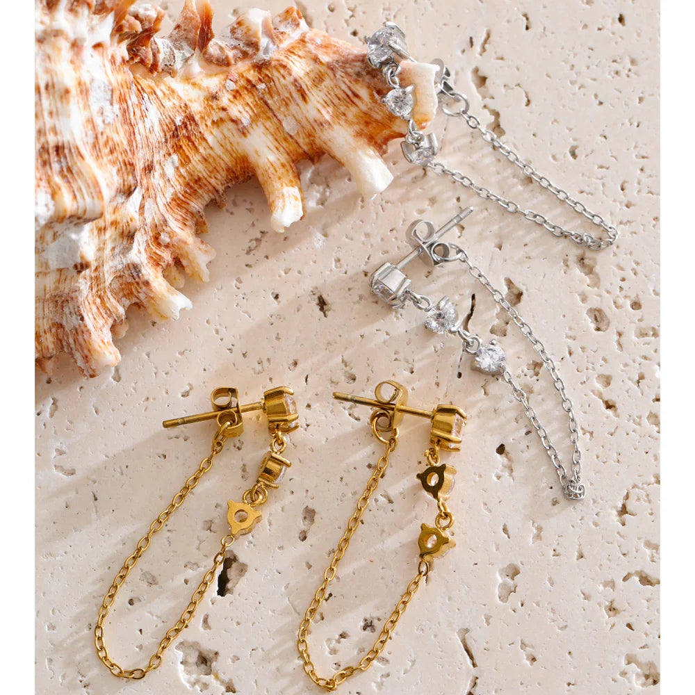 Cubic zirconia geometric chain earrings in gold-plated stainless steel with cubic zirconia.
