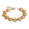 Shell hammered geometric necklace in gold-plated stainless steel with shell.
