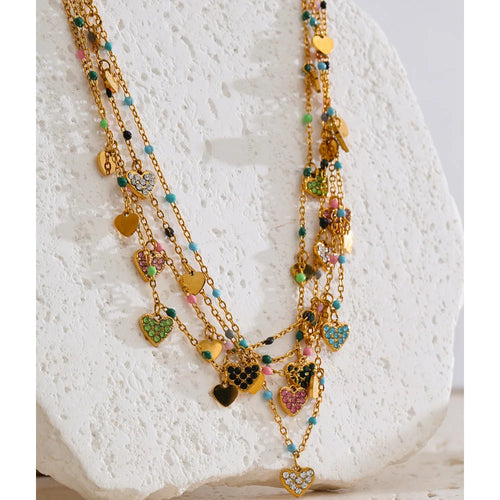 Crystal natural stone heart necklace in gold-plated stainless steel with natural stone and crystal.