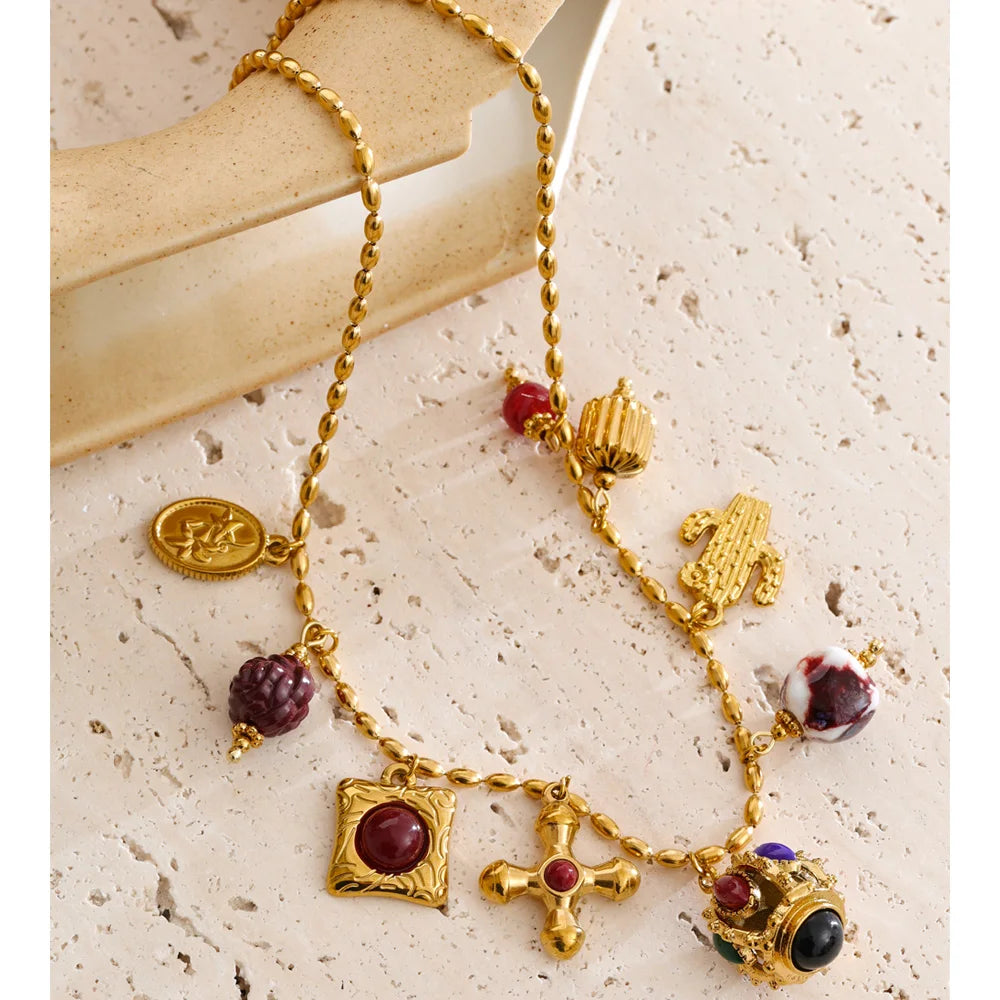Resin acrylic cross necklace in gold-plated stainless steel with resin and acrylic.