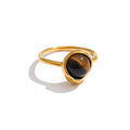 Natural stone geometric ring in 18K gold-plated stainless steel with natural stone.