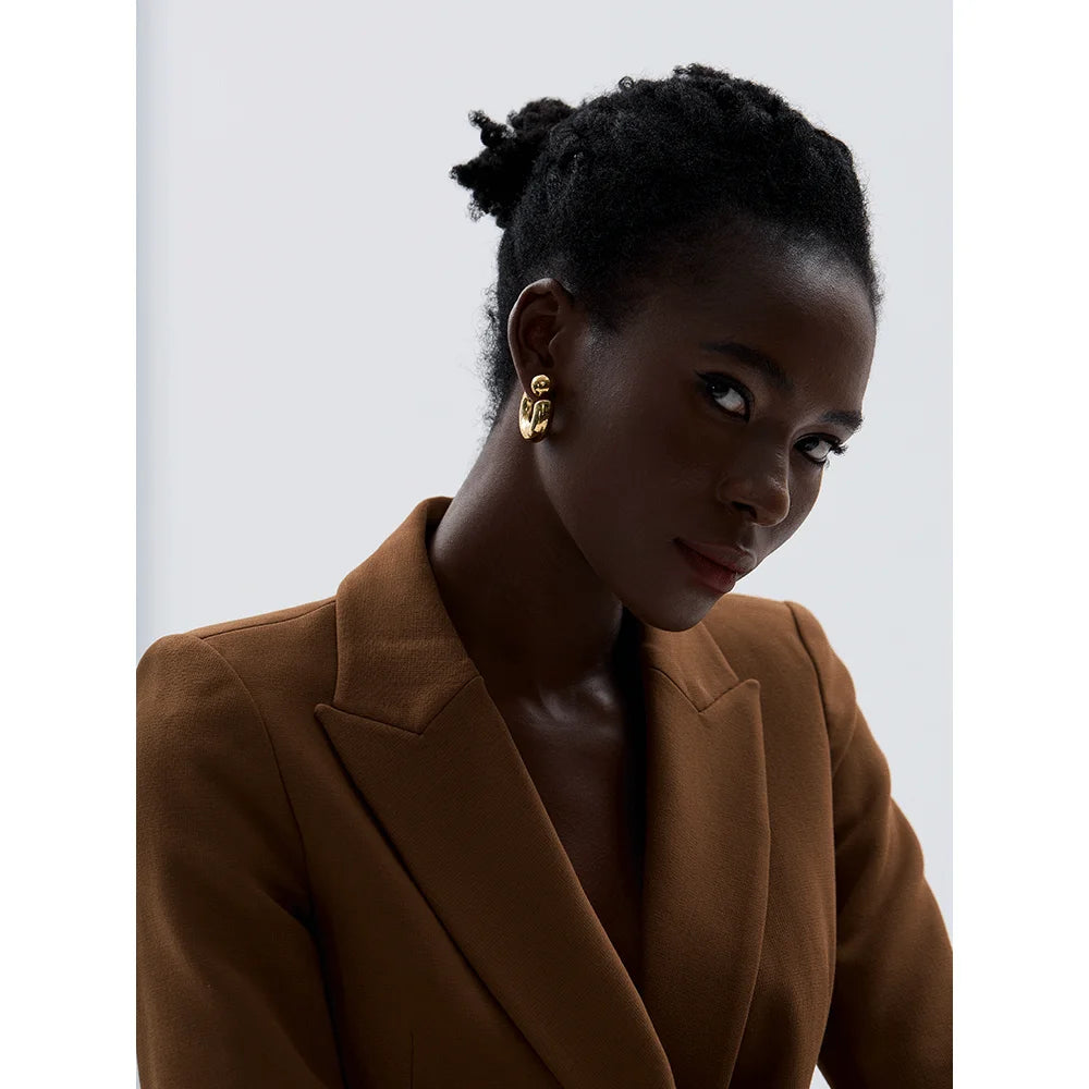Geometric earrings in gold-plated stainless steel.