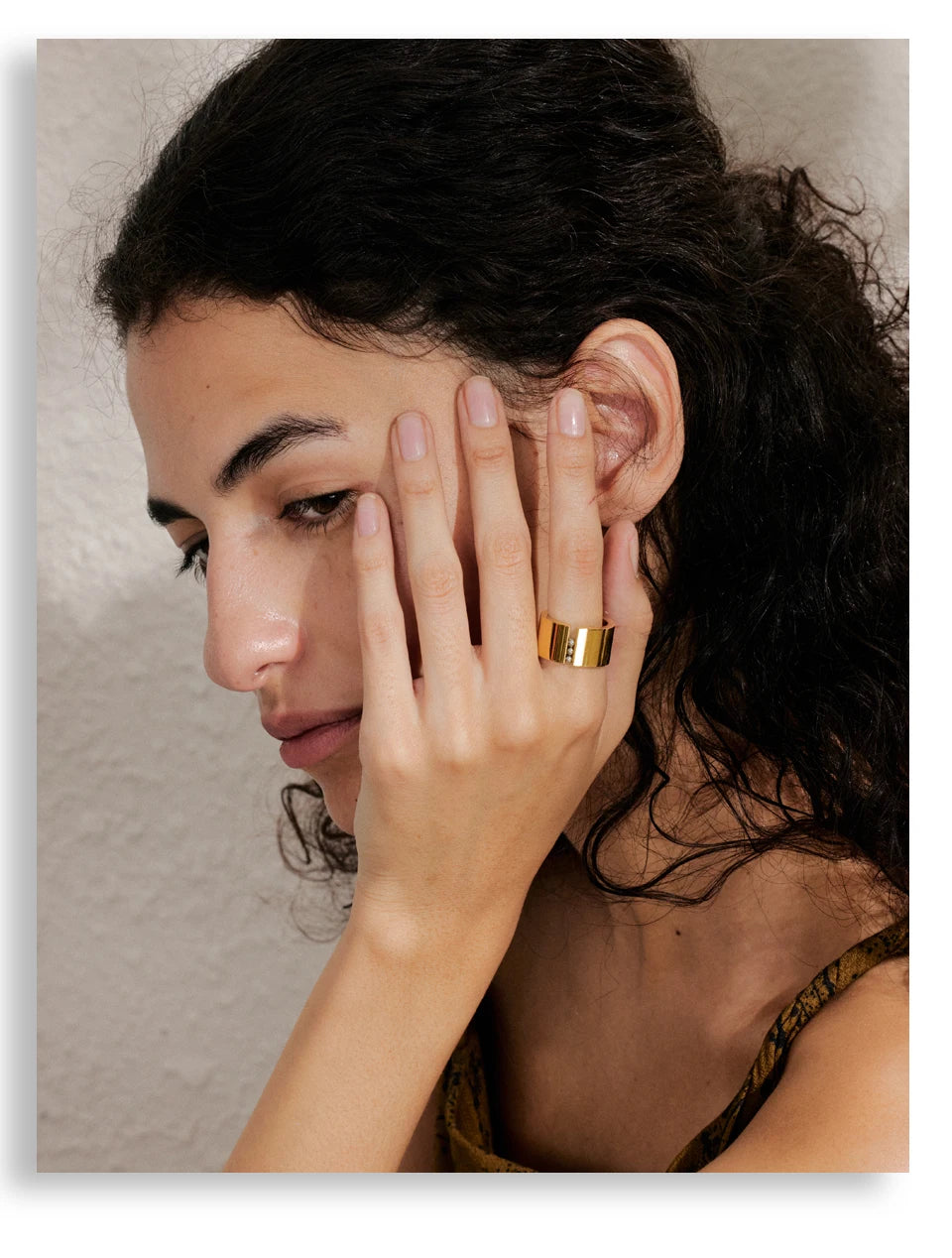 Geometric ring in gold-plated stainless steel.
