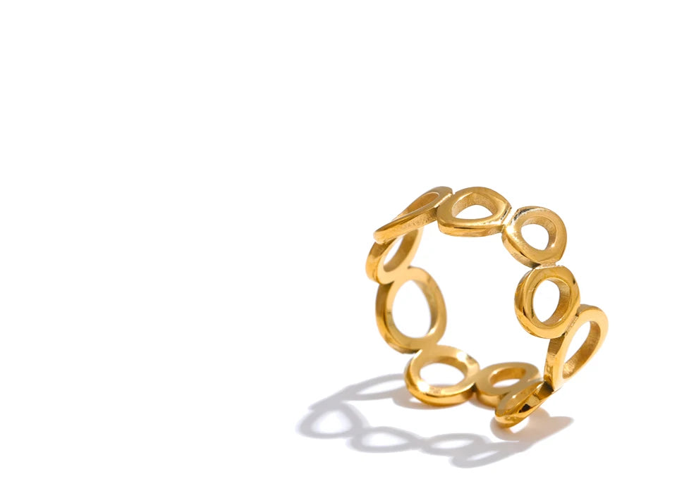 Geometric ring in 18K gold-plated stainless steel.