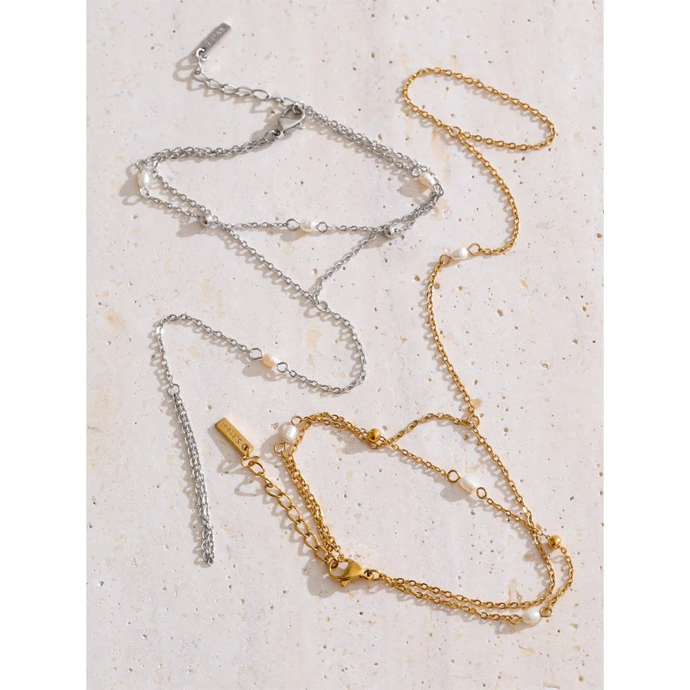 Cubic Zirconia Pearl Flower Bracelet — Gold-Plated Stainless Steel with Pearl and Cubic Zirconia · PS2173
