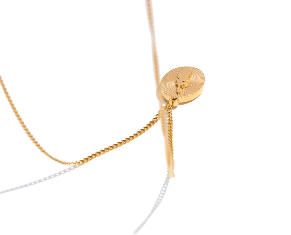 Geometric necklace in gold-plated stainless steel.