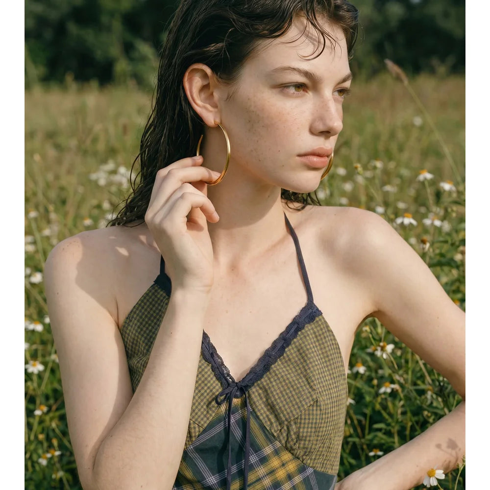 Geometric earrings in gold-plated stainless steel.