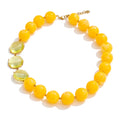 Resin acrylic beaded necklace in gold-plated stainless steel with resin and acrylic.