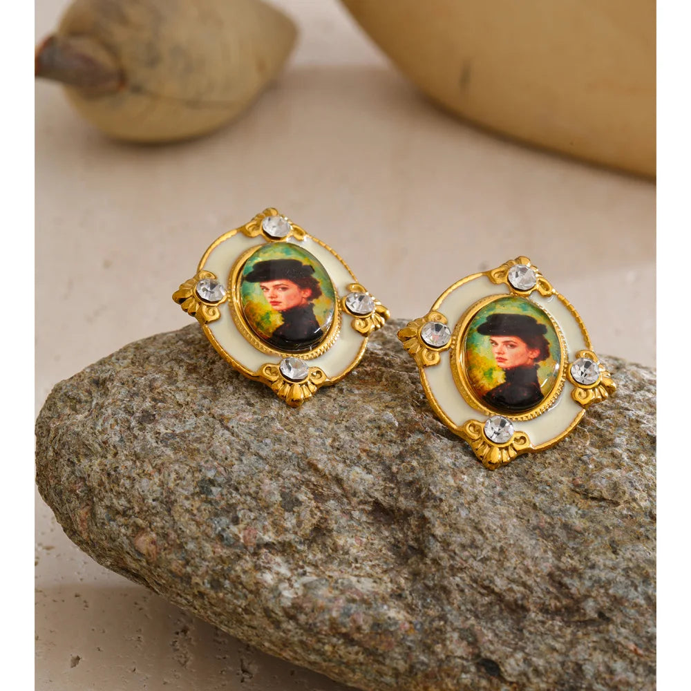 Resin crystal geometric earrings in gold-plated stainless steel with resin and crystal.